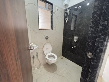 Bathroom in 2 BHK Apartment at Shivam Mrinal CHS, Kandivali East – for Rent