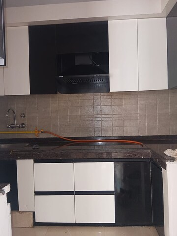 Kitchen in 2 BHK Apartment at Ace Divino, Sector 1 Greater Noida – for Rent