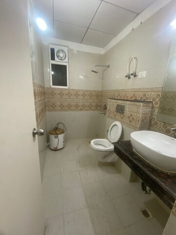 Bathroom in 3 BHK Apartment at Gaur Yamuna City, Gaur Yamuna City – for Rent
