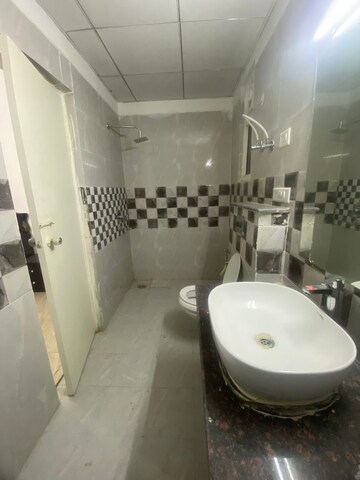 Bathroom in 3 BHK Apartment at Gaur Yamuna City, Gaur Yamuna City – for Rent