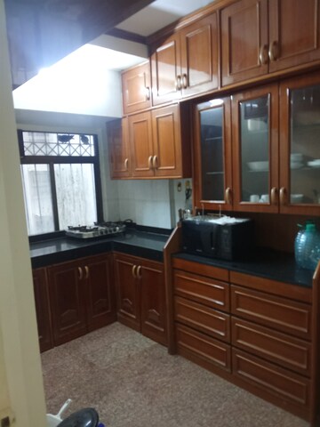 Kitchen in 3 BHK Apartment at Rustomjee Regency, Dahisar West – for Rent
