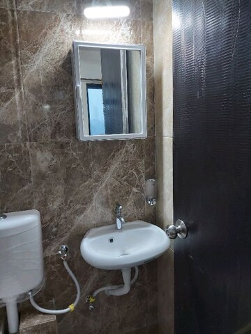 Bathroom in 1 BHK Apartment at Haware Estate, Kasarvadavali – for Rent