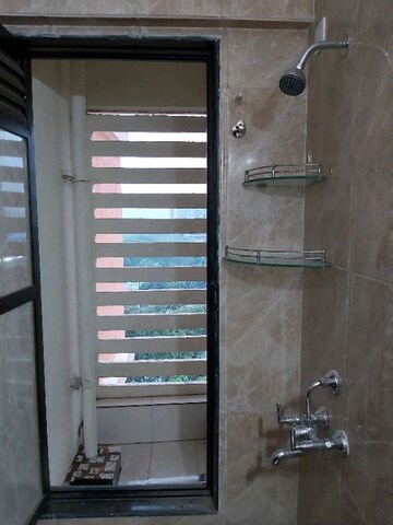 Bathroom in 1 BHK Apartment at Haware Estate, Kasarvadavali – for Rent