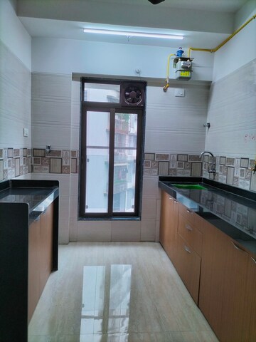 Kitchen in 2 BHK Apartment at Je and Vee Vrindavan, Malad East – for Rent