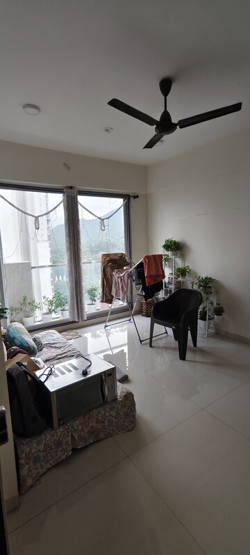 Living Room in 2 BHK Apartment at Harmony Signature Towers, Owale – for Rent