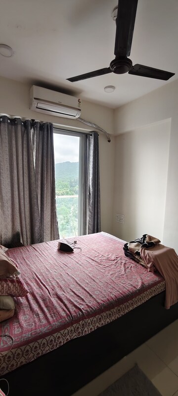 Bedroom in 2 BHK Apartment at Harmony Signature Towers, Owale – for Rent