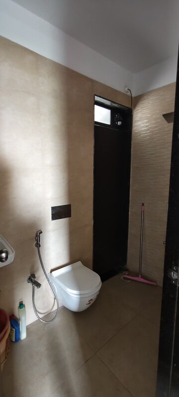 Bathroom in 2 BHK Apartment at Harmony Signature Towers, Owale – for Rent