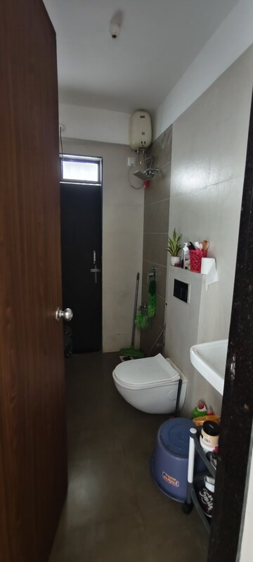 Bathroom in 2 BHK Apartment at Harmony Signature Towers, Owale – for Rent