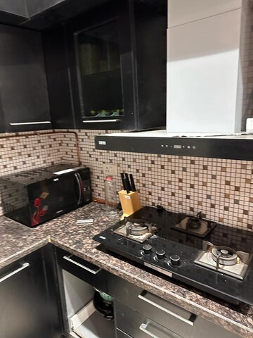 Kitchen in 2 BHK Apartment at Gulshan GC Grand, Vaibhav Khand – for Rent