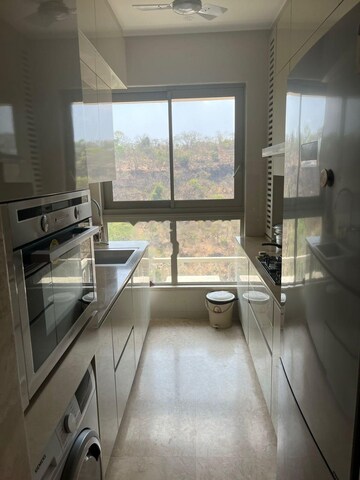 Kitchen in 2 BHK Apartment at Castle Rock, Powai – for Rent