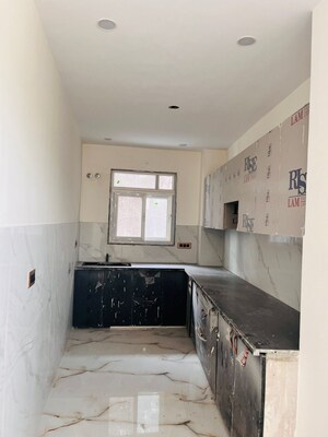 Kitchen in 2 BHK Apartment at Niho Marvel Scottish Garden, Ahinsa Khand 2 – for Sale