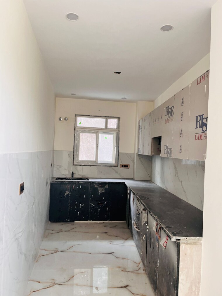 Kitchen, niho-marvel-scottish-garden 2 Bedroom 1075 Sq.Ft. Apartment In Ahinsa Khand 2 Ghaziabad 9003010