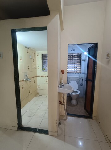 Bathroom in 1 BHK Apartment at Kopar Khairane – for Rent