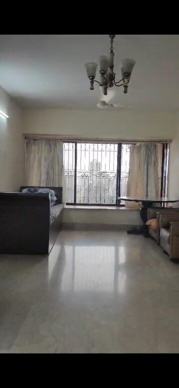 Living Room in 4 BHK Apartment at Lokhandwala Complex, Andheri West – for Rent