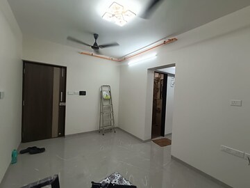 Room in 1 BHK Apartment at Veena Smart Homes, Kandivali West – for Rent