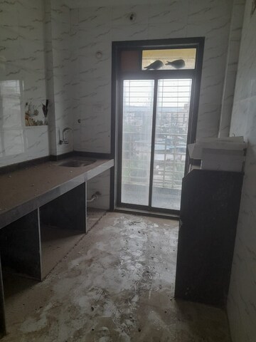 Kitchen in 2 BHK Apartment at Balaji Mital Arcade, Badlapur West – for Sale