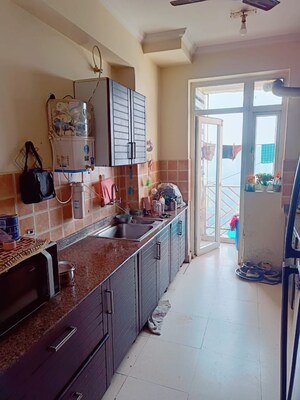 Kitchen in 3.5 BHK Apartment at Amrapali Eden Park, Sector 50 – for Sale