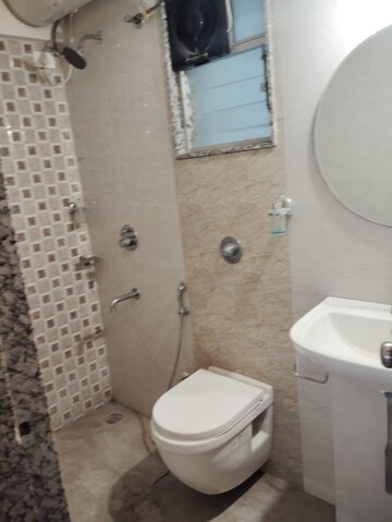 Bathroom in 3 BHK Apartment at Axis Paradigm Whistling Meadows, Paud Road – for Rent