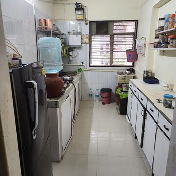 Kitchen in 1 BHK Apartment at Niwara CHS Andheri West, Sv Patel Nagar – for Rent