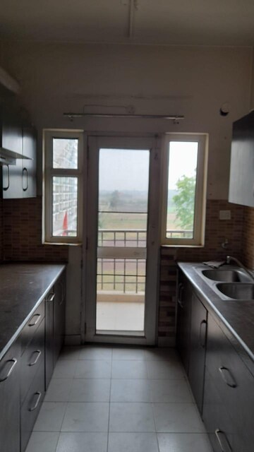 Kitchen in 3 BHK Apartment at Sushma Urban Views, Ghazipur – for Rent