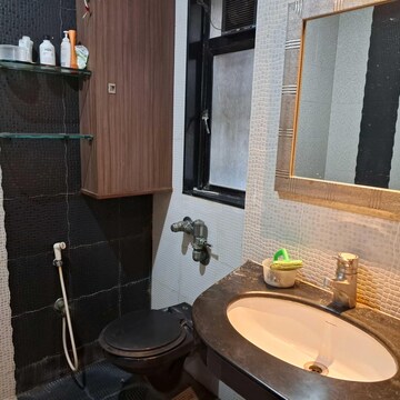 Bathroom in 4 BHK Apartment at Lokhandwala Complex – for Rent