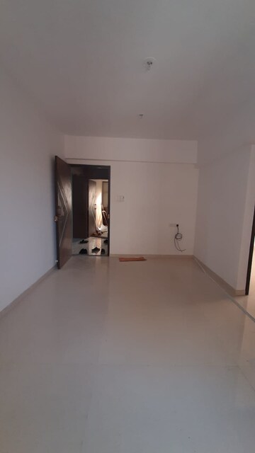 Living Room in 1 BHK Apartment at Samarth Seasons Sahara, Kalyan East – for Rent