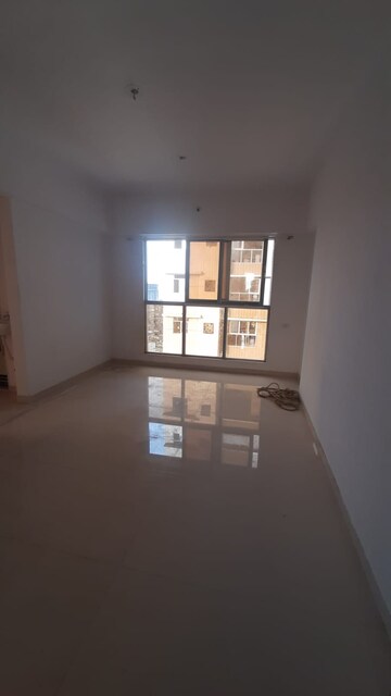 Living Room in 1 BHK Apartment at Samarth Seasons Sahara, Kalyan East – for Rent