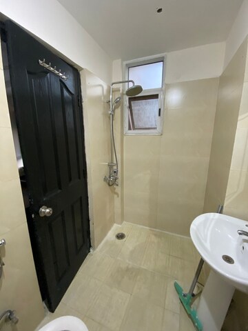 Bathroom in 2 BHK Apartment at Prateek Wisteria, Sector 77 – for Rent