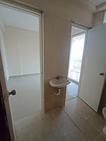 Bathroom in 1 BHK Apartment at Shree Vardhman Green Court, Sector 90 – for Sale