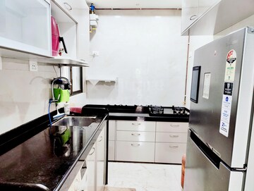Kitchen in 1.5 BHK Apartment at Crystal Paradise, Andheri West – for Rent
