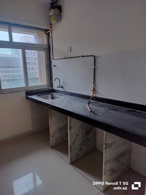 Kitchen in 1 BHK Apartment at Squarefeet Ace Square, Ghodbunder Road – for Sale