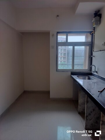 Kitchen in 1 BHK Apartment at Squarefeet Ace Square, Ghodbunder Road – for Sale