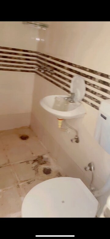 Bathroom in 2 BHK Apartment at Shree Vardhman Green Court, Sector 90 – for Rent
