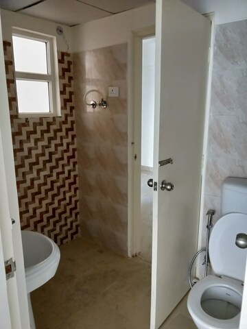 Bathroom in 3 BHK Apartment at Gaur City 2 - 14th Avenue, Sector 16c Greater Noida – for Rent