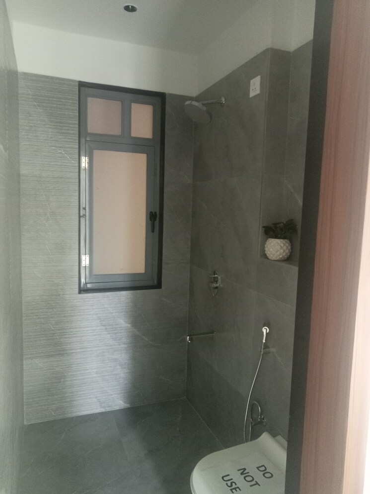 Bathroom, saniket-the-rising 2 Bedroom 801 Sq.Ft. Apartment In Kiwale Pune 9003686