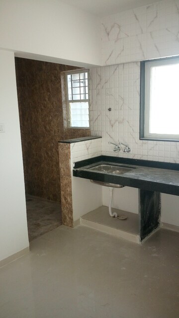 Kitchen in 2 BHK Apartment at Vinode Spirea, Wakad – for Sale