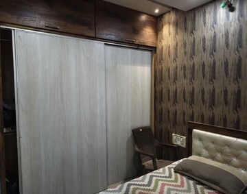 Bedroom in 2 BHK Apartment at Tharwani Rosewood Heights, Kharghar Sector 10 – for Rent