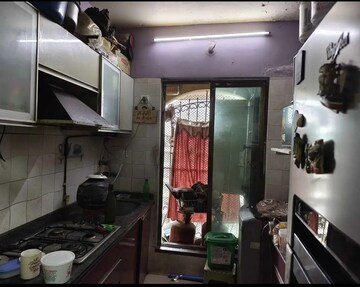 Kitchen in 2 BHK Apartment at Tharwani Rosewood Heights, Kharghar Sector 10 – for Rent