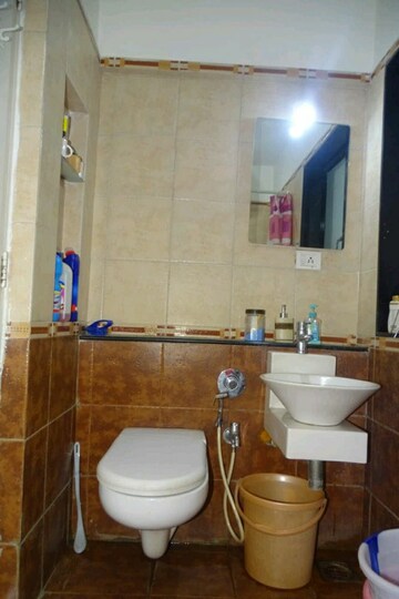 Bathroom in 2 BHK Apartment at Swapnalok Towers, Malad East – for Rent
