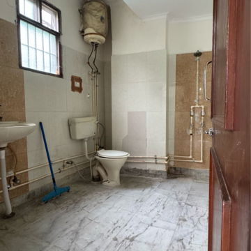 Bathroom in 1 BHK Builder Floor at Palm Residency Chhatarpur, Rajpur Khurd Extension – for Rent