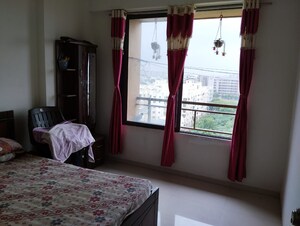 Bedroom in 2 BHK Apartment at Basil Skyline, Tragad – for Sale