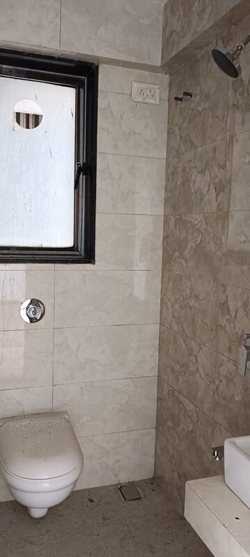 Bathroom in 1 BHK Apartment at Neumec Shreeji Towers, Wadala East – for Rent