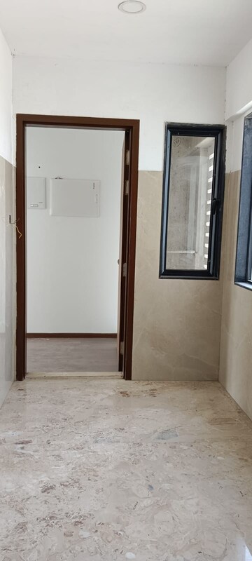 Building Lobby in 1 BHK Apartment at Neumec Shreeji Towers, Wadala East – for Rent