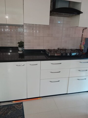 Kitchen in 2 BHK Apartment at Raj Infinia, Malad West – for Rent
