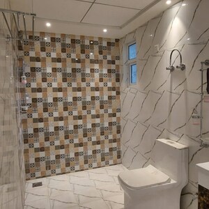 Bathroom in 3.5 BHK Apartment at Sikka Karnam Greens, Garhi Village – for Sale