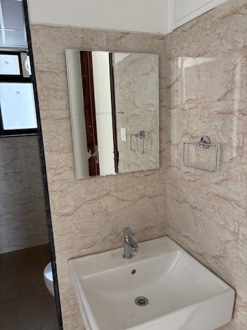 Bathroom in 2 BHK Apartment at Shapoorji Pallonji Sensorium, Hinjewadi – for Rent