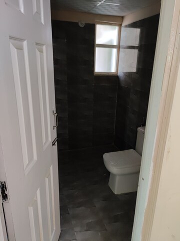 Bathroom in 2 BHK Apartment at Migsun Roof, Raj Nagar Extension – for Rent