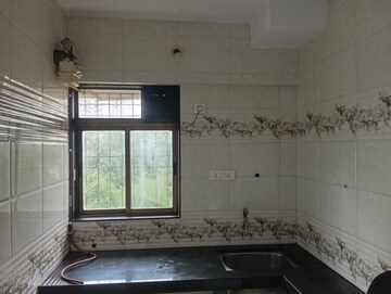 Kitchen in 1 BHK Apartment at Ideal Pristine Tower, Kasarvadavali – for Rent
