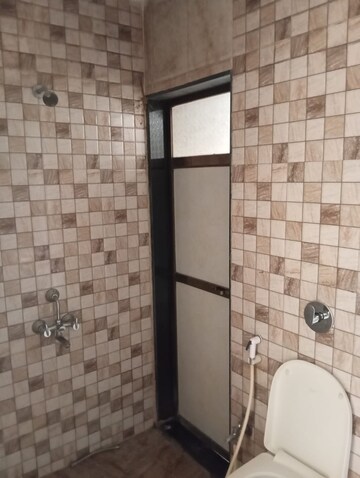 Bathroom in 1 BHK Apartment at Ideal Pristine Tower, Kasarvadavali – for Rent