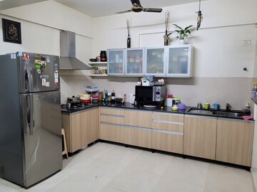 Kitchen in 2 BHK Apartment at Gera Song Of Joy, Kharadi – for Rent